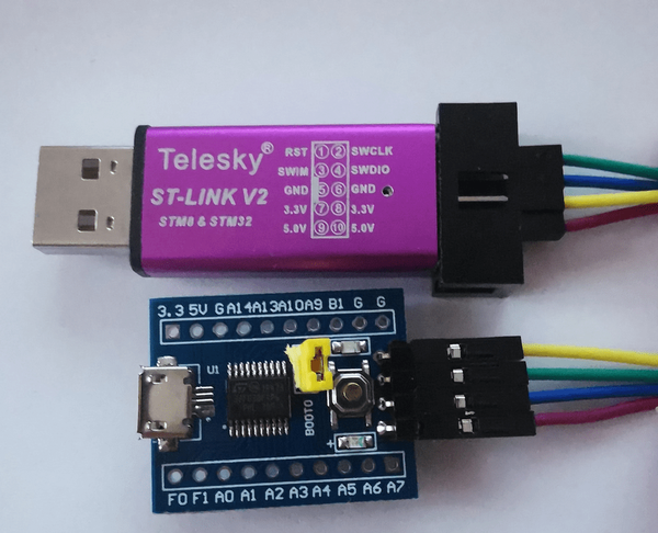 ST-Link v2 mini clone connected to STM32F030F4P6 based board